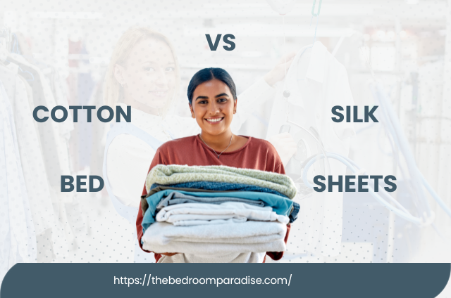 a woman holding a stack of folded clothes